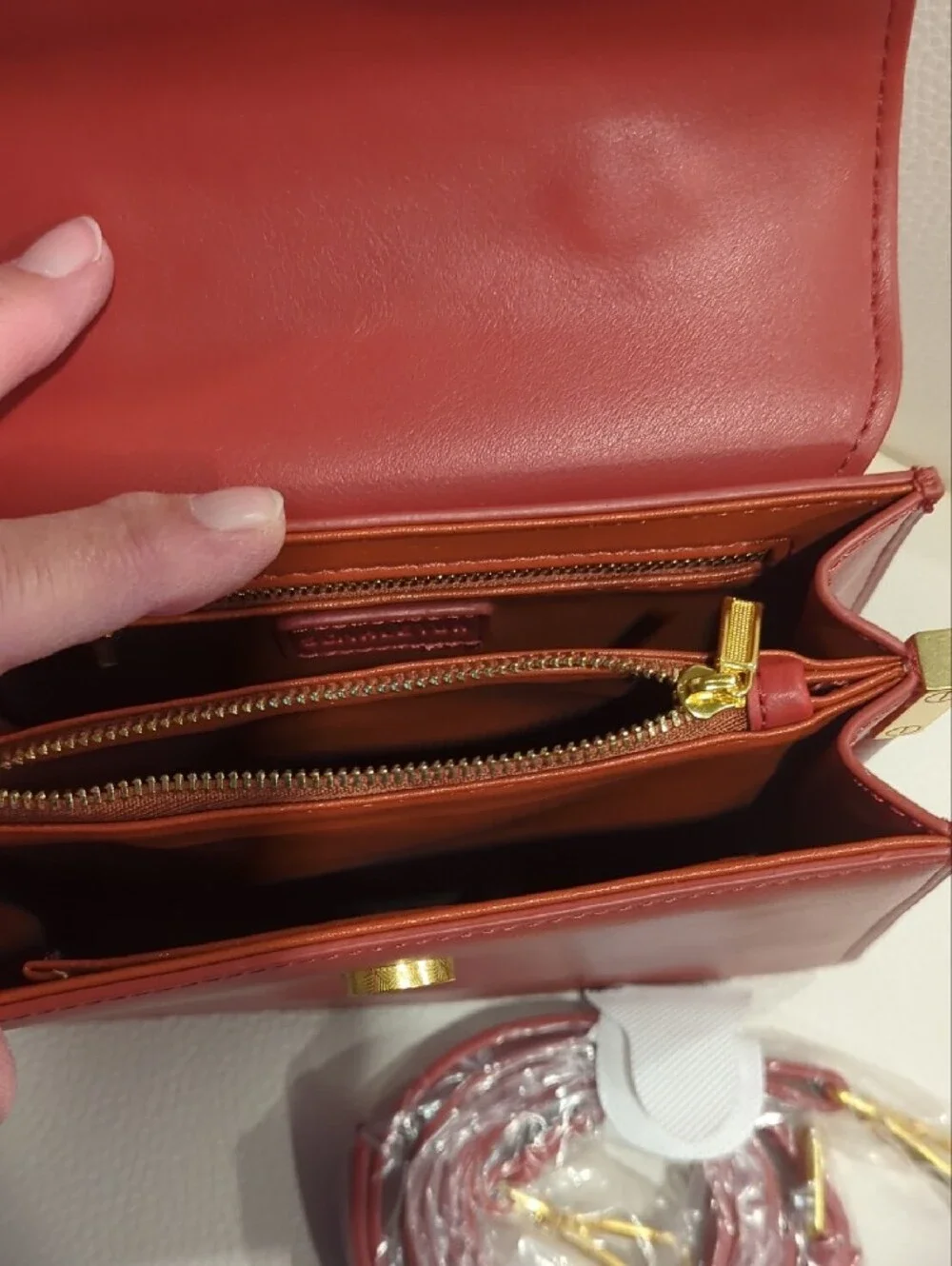 Elegant Rust Top-Handle Crossbody Bag with Gold Accent
